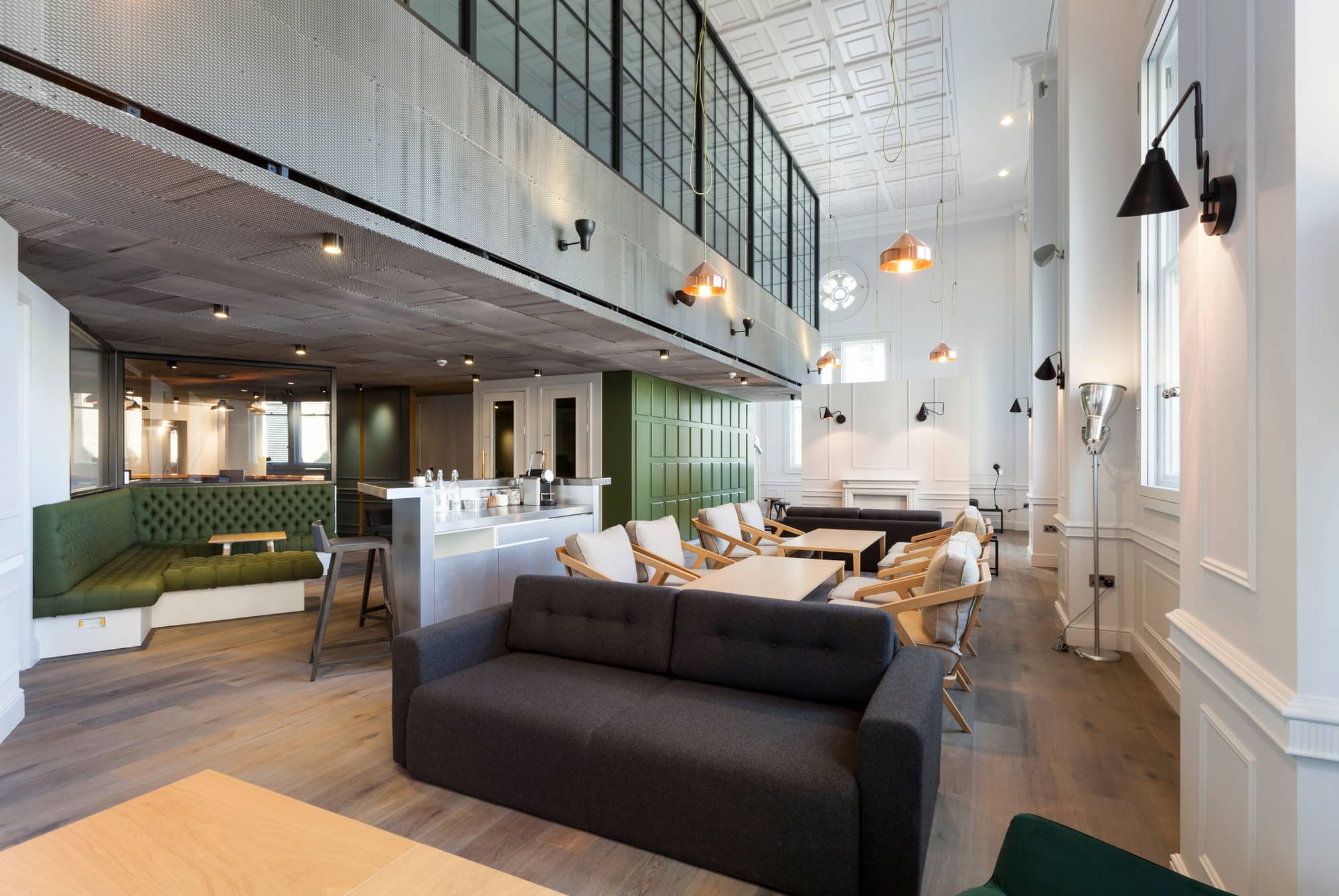 Modern, open plan lounge with lockers and coffee station.