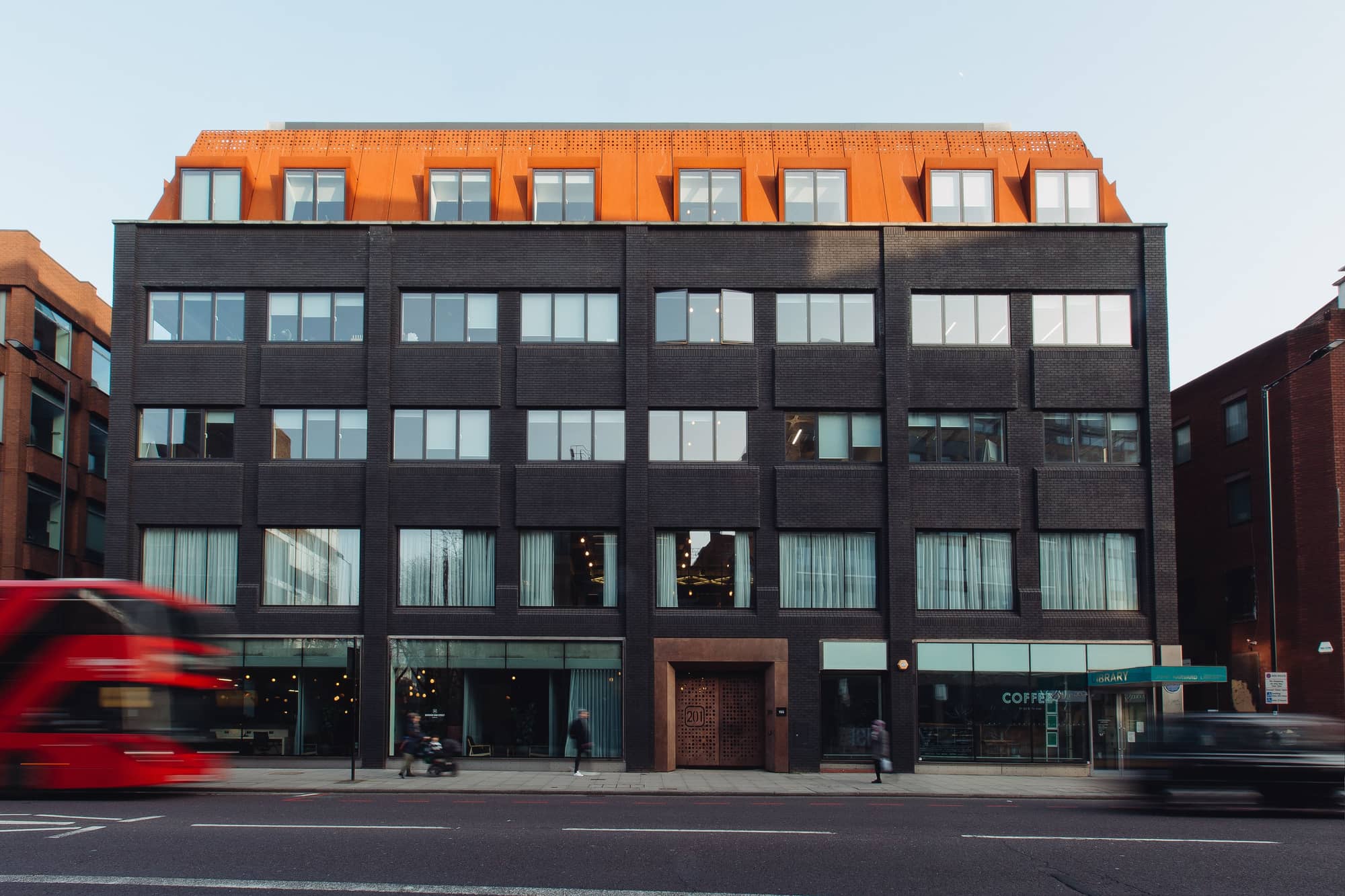 Modern seating booths at the 201 Borough High Street workspace.