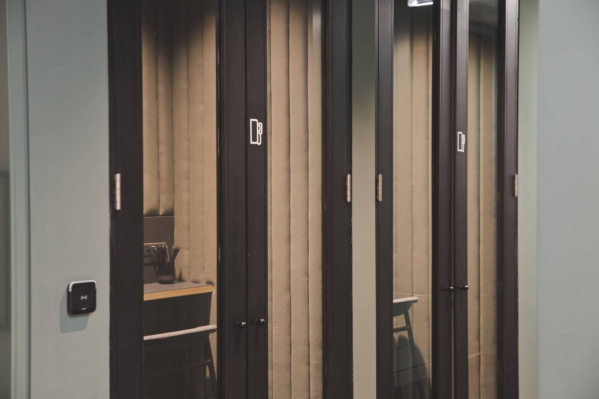 Private phone booths at Fora's 2 Stephen Street workspace.