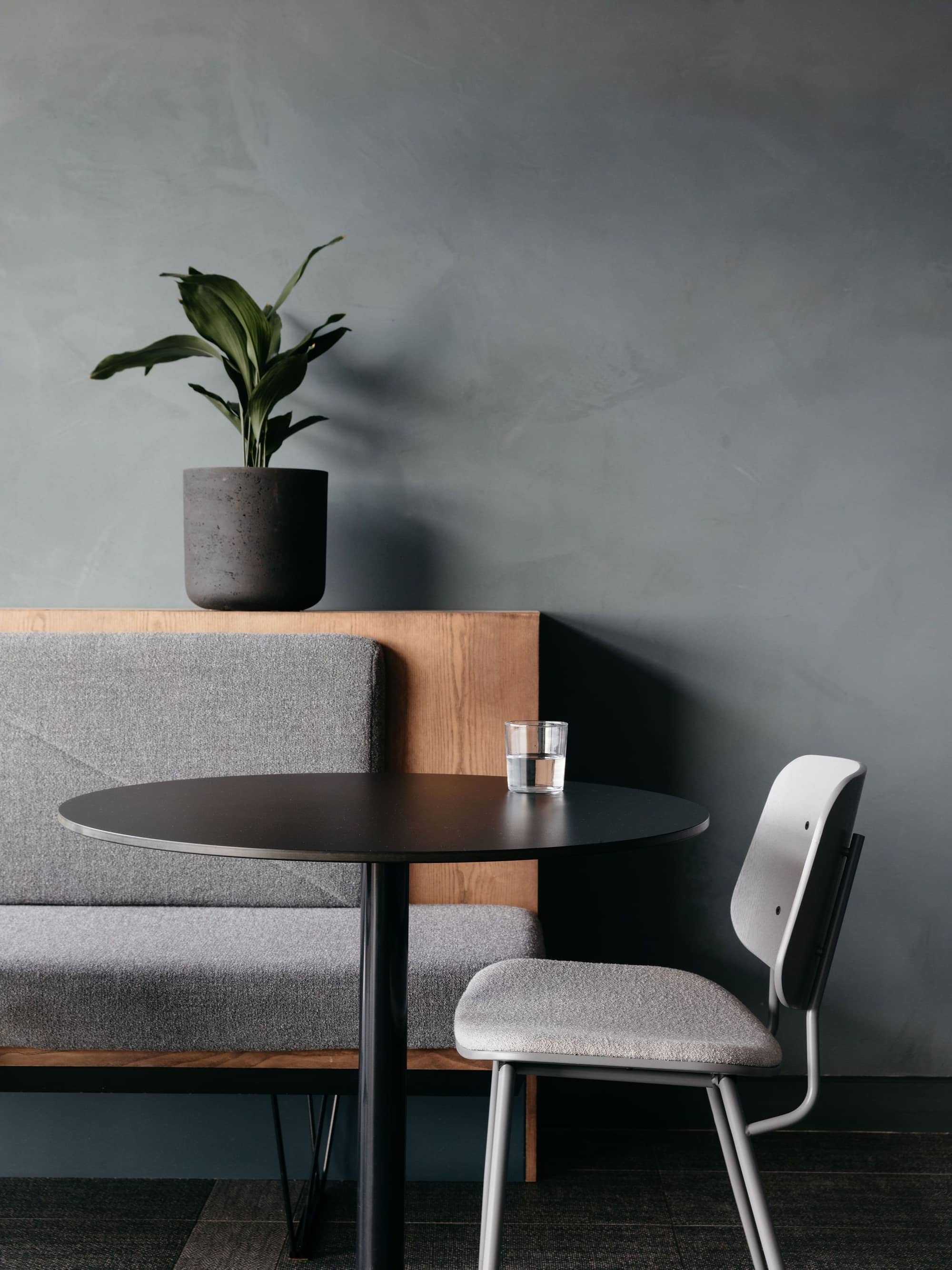 Contemporary seating area at 20 Eastbourne Terrace with a table and chair.