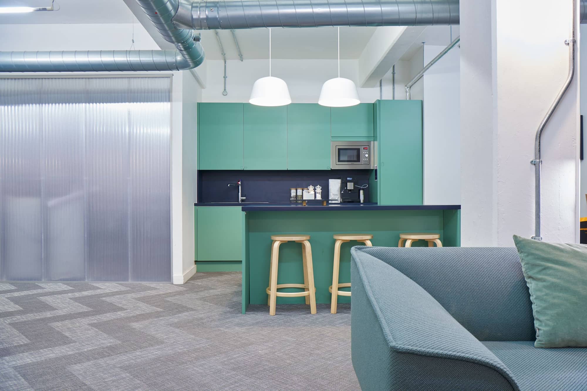 Minimalist kitchen area at 133 Whitechapel High Street.