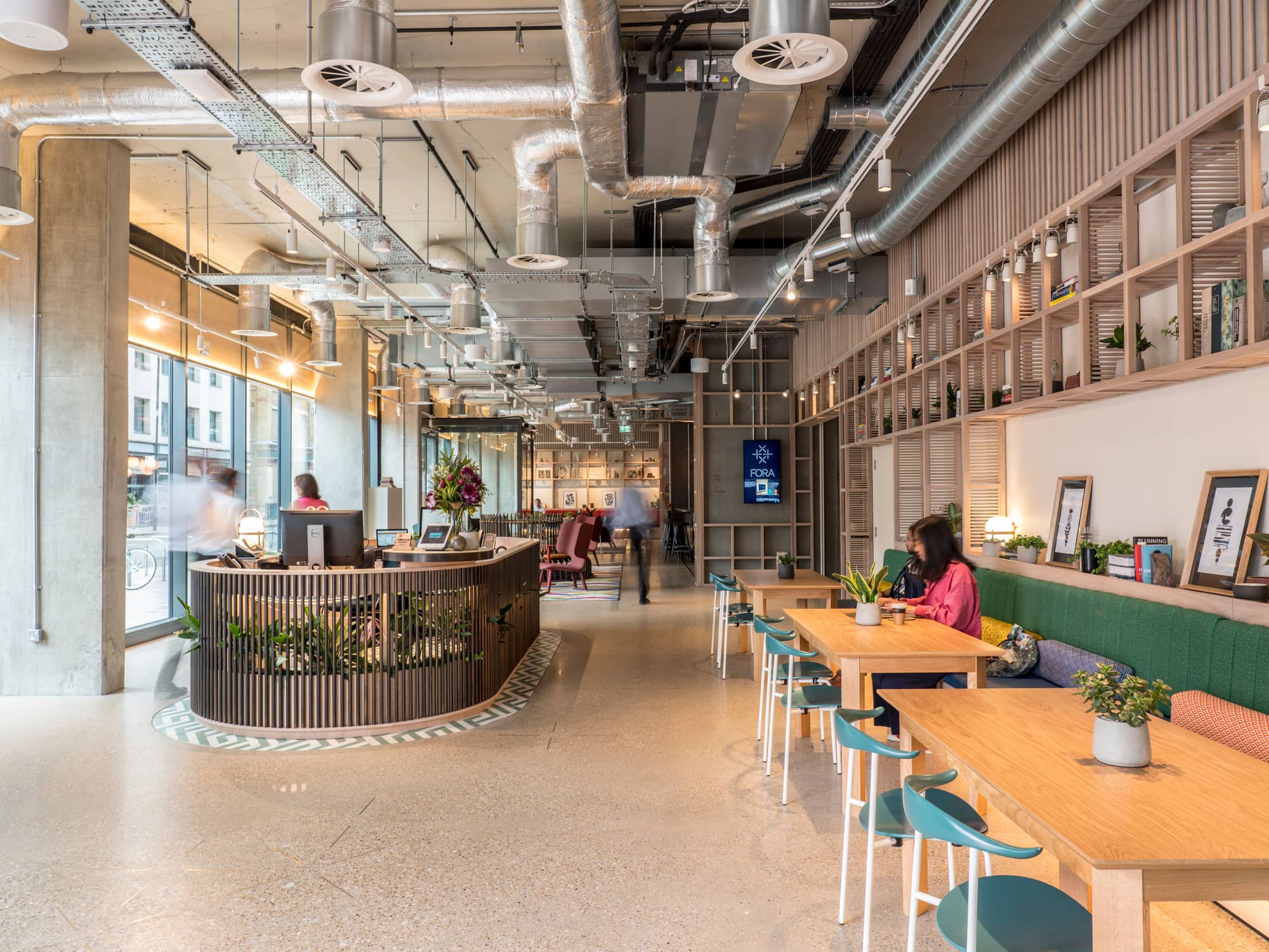 180 Borough High Street workspace entrance with people sitting and working.