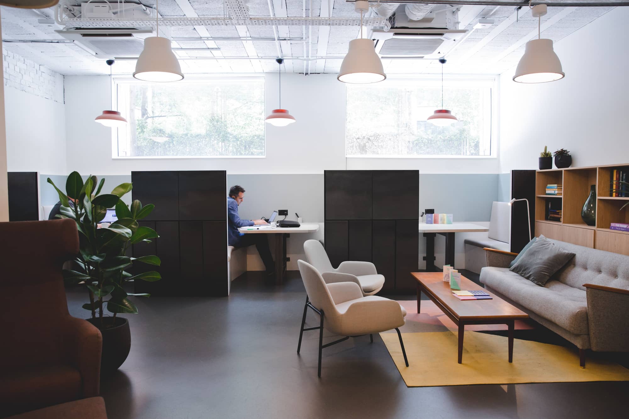 Shared workspace with individual working booths at Lloyds Avenue.